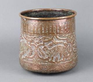 An Eastern cylindrical embossed copper jardiniere decorated animals amongst trees 25cm h x 24cm diam. 