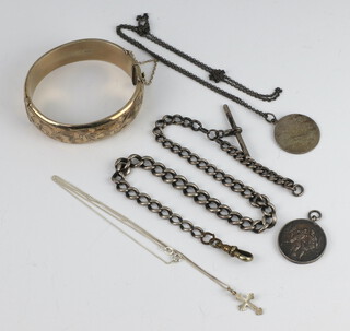 A silver bangle, Albert, 2 pendants, a chain and a cross and chain, 85 grams
