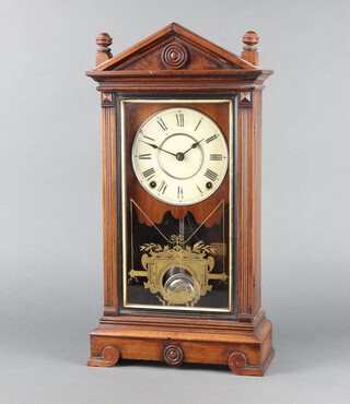 An American striking shelf clock with 14cm paper dial contained in a walnut case 51cm h x 27cm w x 12cm d together with an associated walnut bracket 18cm h x 33cm w x 15cm d, complete with pendulum and key 