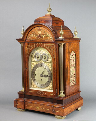 A handsome Victorian 8 day fusee grand sonnier striking bracket clock, the 18cm arched brass dial with gilt metal spandrels, silvered chapter ring, strike/silent dial, chime on 8 bells and Westminster chime dial, striking on 8 bells and 5 gongs contained in an inlaid rosewood and brass mounted case, the back with 19cm plain unmarked back plate, complete with pendulum and key, case without bracket 76cm h x 41cm w x 26cm d, the associated carved and fluted mahogany bracket 48cm h x 47cm w x 29cm d  