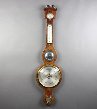 B Nazzuchis of Gloucester, a mercury wheel barometer and thermometer with damp/dry  indicator, silvered dial and spirit level contained in a mahogany case 96cm h x 25cm w x 3cm d 