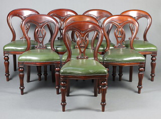 A set of 8 Victorian style slat back mahogany dining chairs with green leatherette overstuffed seats, raised on turned and fluted supports 89cm h x 50cm w x 37cm d (seats 26cm x 27cm) 
