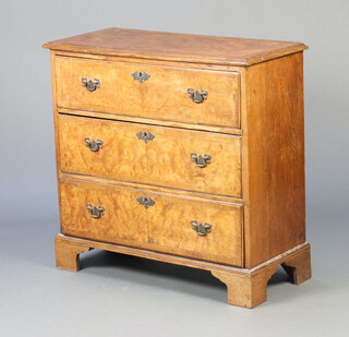 A 19th/20th Century Queen Anne style walnut and crossbanded chest of 3 drawers with replacement brass plate drop handles, raised on bracket feet 80cm h x 84cm w x 37cm d  