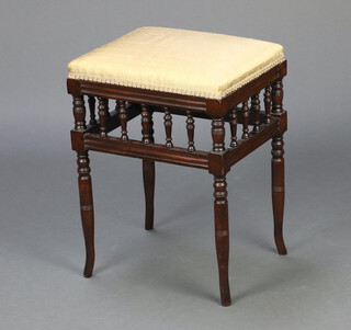 An Edwardian rectangular mahogany stool with bobbin turned decoration, raised on turned supports 54cm h x 40cm w x 32cm d 