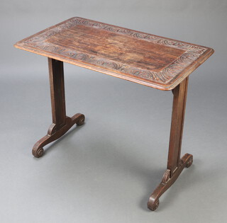 A Victorian rectangular carved oak side table, raised on panel supports 73cm h x 89cm w x 53cm d 