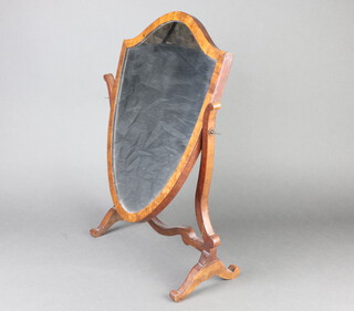 A Sheraton style shield shaped plate dressing table mirror contained in a mahogany swing frame 51cm x 35cm x 16cm  