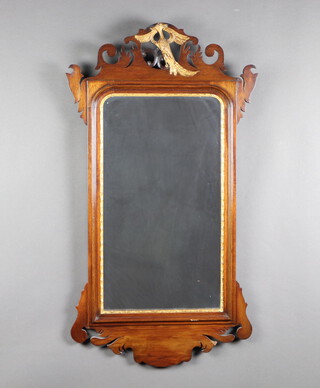 A rectangular Chippendale style plate wall mirror surmounted by a bird 92cm x 50cm 