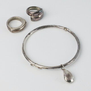 A silver bangle and 2 rings 34 grams 