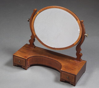 A 19th Century oval plate bevelled plate dressing table mirror contained in an inlaid mahogany frame, the concave base fitted 2 drawers, raised on bracket feet 51cm h x 57cm w x 22cm d 