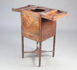 A 19th Century square mahogany enclosed washstand, fitted 3 bowl receptacles above cupboard enclosed by a panelled door, the base with drawer and X framed undertier, raised on square supports 85cm h x 37cm w x 38cm d 