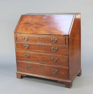 A Georgian mahogany bureau, the fall front revealing a fitted interior with pigeon  holes and drawers above 4 drawers with brass swan neck handles, raised on bracket feet 110cm h x 100cm w x 56cm d 
