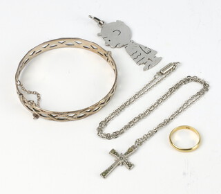A yellow metal 18ct wedding band 1.9 grams, a bracelet, pendant and cross and chain