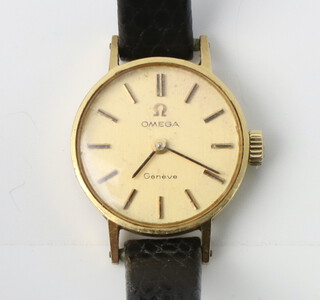 A lady's Omega 18ct yellow gold wristwatch no.511297 on a leather strap, the movement stamped 620, contained in a 18mm case  