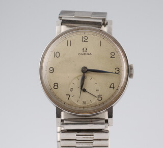 A gentleman's vintage steel cased Omega wristwatch with seconds at 6 o'clock, the case stamped 10031957, movement stamped 9179463 contained in a 33mm case 
