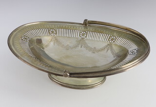 A Victorian silver swing handled basket with pierced and engraved decoration London 1876, 502 grams, 29cm 