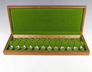 A set of 12 silver Royal Horticultural Society flower spoons by John Pinches, Sheffield 1973, 299 grams, boxed 