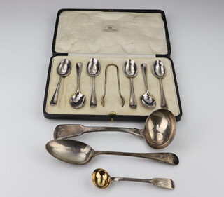 A set of 6 silver coffee spoons and sugar nips, Sheffield 1920, a ladle, dessert spoon and mustard spoon, 230 grams 