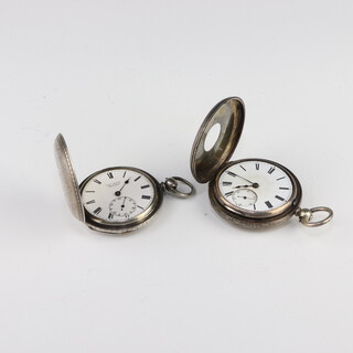 A Victorian silver half hunter pocket watch London 1880 together with a Continental silver hunter pocket watch 