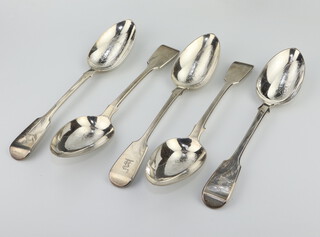 A matched set of Victorian silver fiddle pattern tablespoons London 1843, 1848, 392 grams 