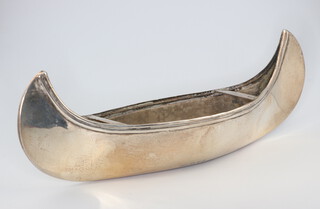 A Victorian silver model of a kayak, Chester 1897, 17cm, 78 grams 