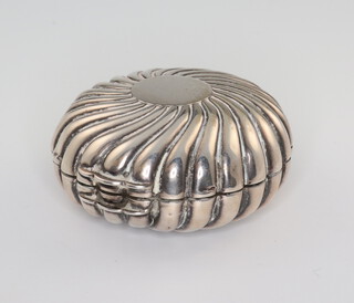 A Victorian circular repousse silver trinket box, London 1891, maker Samuel Mordan  & Co, 4.5cm, 46 grams 