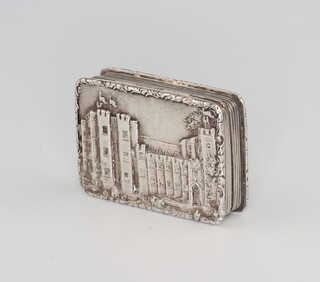 A good Victorian silver castle top vinaigrette, the lid decorated with a view of Kenilworth Castle with pierced floral gilt grill by Nathaniel Mills, rubbed date letter (probably 1839), engraved on the base Sarah, 3.75cm    