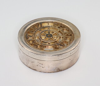 A circular silver gilt snuff box, the gilt lid  Secretan 1789-1989, London 1989 5.5cm, 84 grams 