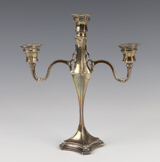 An Art Nouveau 3 light silver candelabrum with scroll arms, Birmingham 1934, 25cm, weighted base 