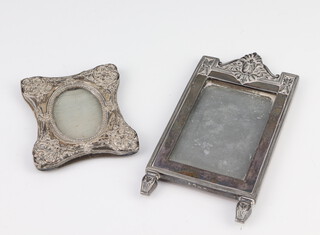 An Edwardian repousse silver photograph frame decorated with flowers 9cm, (holed), a plated ditto 16cm