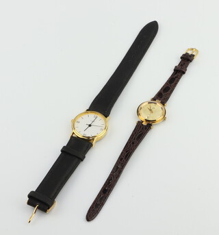A gentleman's gilt quartz wristwatch and lady's ditto 