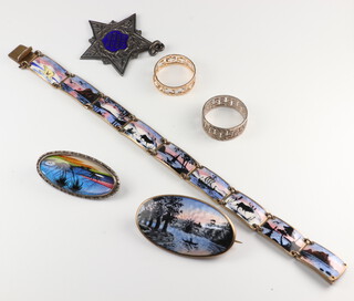 A silver and enamelled bracelet and 2 brooches together with a silver fob and a 14ct pierced band 1.2 grams 