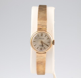 A lady's 9ct yellow gold Nivada wristwatch 14.6 grams including the glass 