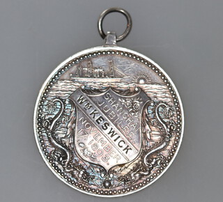 A silver commemorative medallion Shanghai Jubilee November 17th 1893 to W M Keswick.