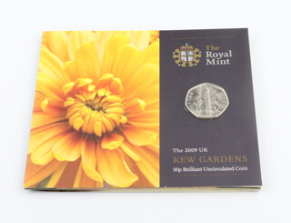 A 2009 Kew Gardens 50 pence brilliant uncirculated coin, in original folder 