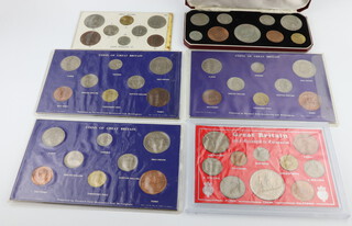 A 1965 cased coin set and 5 other sets