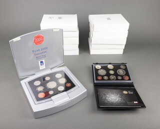 Twelve Royal Mint deluxe coin sets 1998 - 2008, 2010 and 2011  