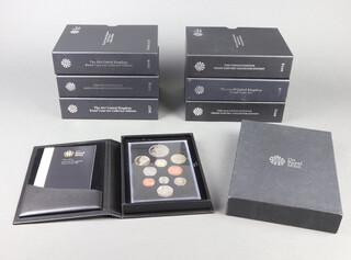 Eight Royal Mint United Kingdom proof coin sets 2008 and 2012-2018 