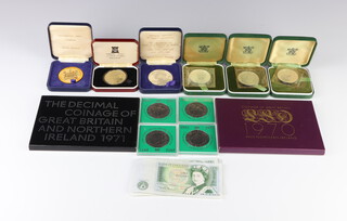 A 1974 commemorative Winston Churchill Centenary crown, 5 other cased crowns, minor coins and banknotes 