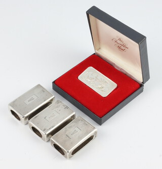 A set of 3 silver engine turned match box holders, monogrammed V, together with an ingot, 90 grams 