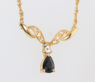 An 18ct yellow gold sapphire and diamond pendant and necklace 4.2 grams