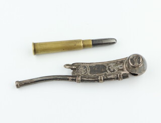 An Edwardian silver plated bosun's whistle together with a pencil bullet 