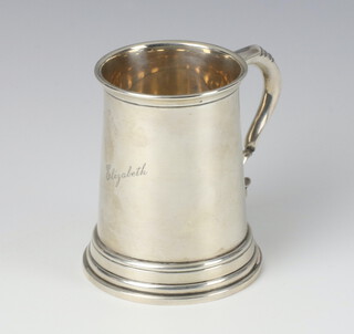 A silver mug engraved Elizabeth with S scroll handle, Sheffield 1913, 8.5cm, 102 grams 