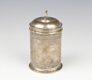 A Continental white metal cylindrical box and cover with engraved decoration 14cm