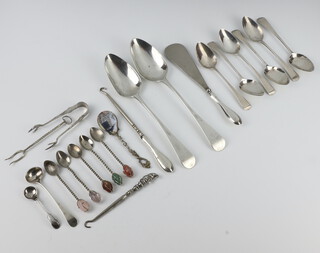 A near pair of George III Old English silver table spoons and minor silver cutlery, 200 grams 