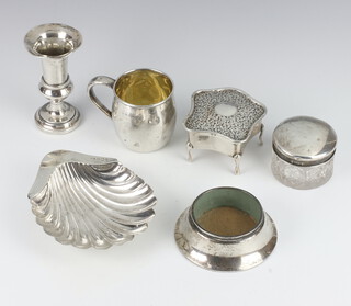 A Victorian silver shell butter dish Sheffield 1897, a Kiddish cup, mug, toilet jar, stand and trinket box (a/f), weighable silver 206 grams 