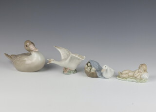 A Lladro figure of a goose and goslings in a basket 4895 5cm, a ditto of a goose 13cm, a sleeping baby 8cm and a duck 16cm (stuck beak) 
