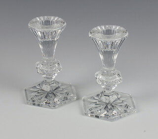 A pair of Waterford glass hexagonal candlesticks 13cm  