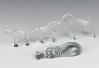 A Kosta Boda style glass hippopotamus 19cm, an Airedale Terrier 13cm, a horse 9cm and an elephant 9cm (chipped)