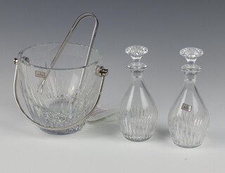 A Baccarat Crystal ice bucket and tongs, a pair of ditto oil bottles 16cm 