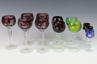 Five amethyst hock wine glasses with vinous decoration, 2 smaller red ditto, 1 pail (chipped), 1 dark green (chipped), 3 totts 